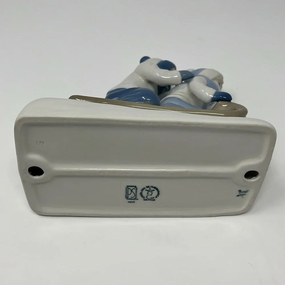 Porcelana De Cuernavaca Mexico Sledding Children Figurine